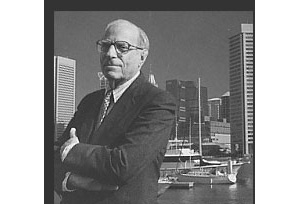 photo of Mr. Walter Sondheim with Baltimore skyline in background